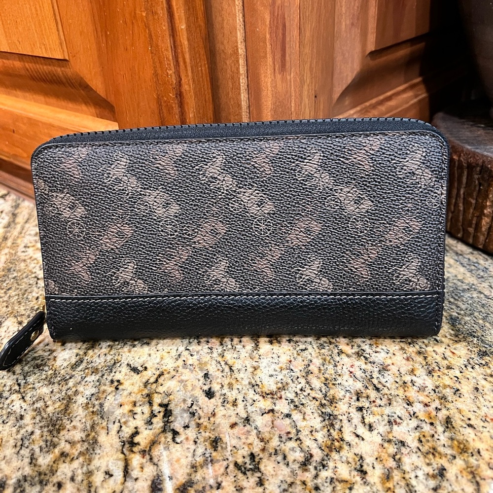 Coach Canvas and Leather Zip around wallet/clutch.